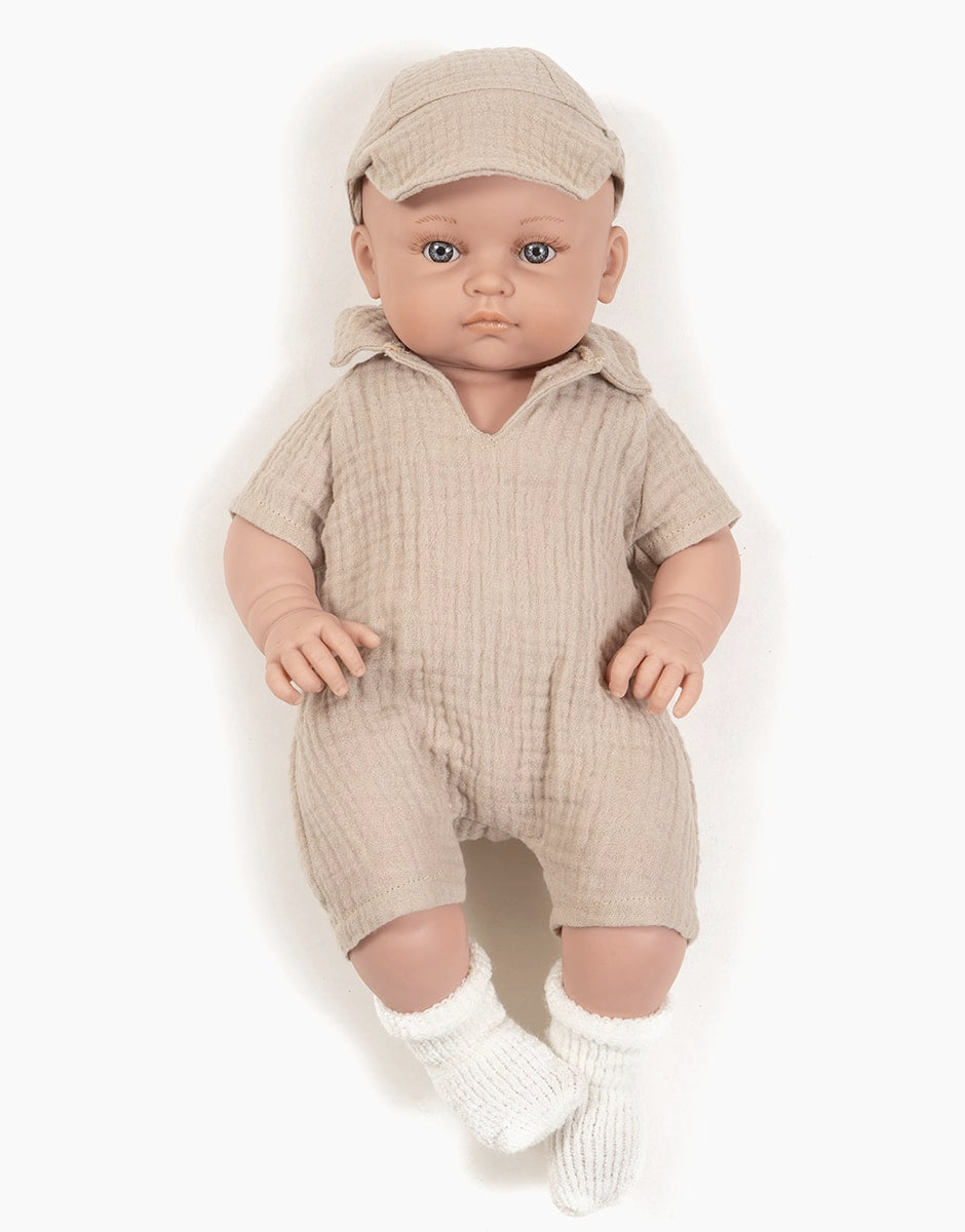 Yann dressed in his Tom jumpsuit and beige double gauze cap