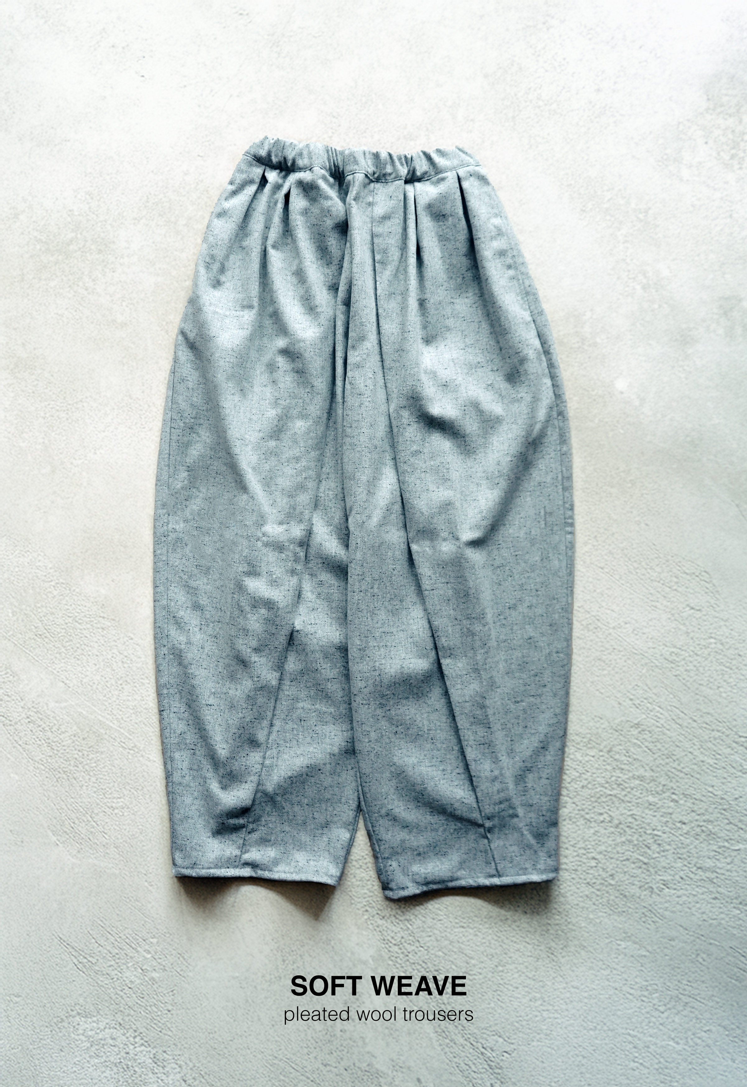 Pleated wool trousers