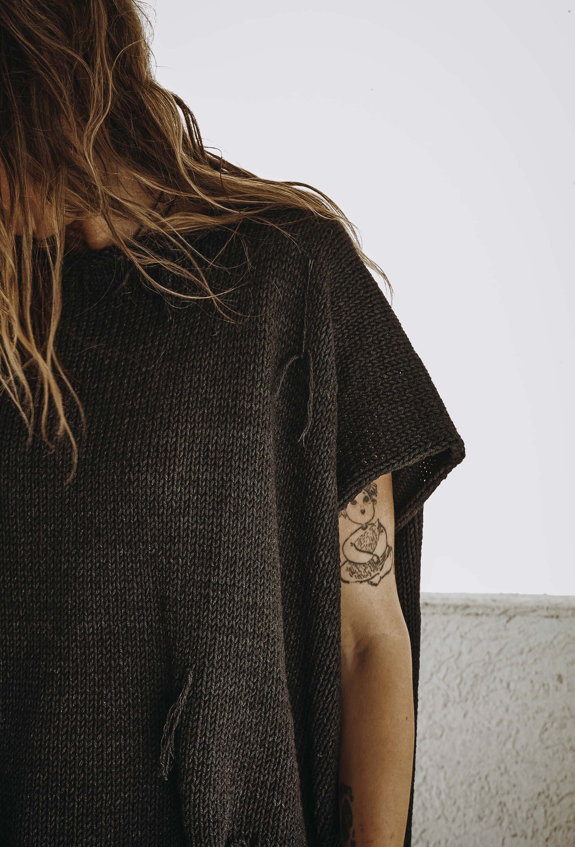 Distressed cotton sweater